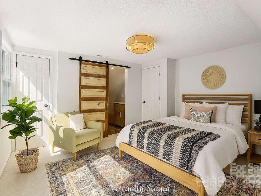 3921 Lake Road, Charlotte, NC 28269.  MLS# CAR4272697, YatesRealty ID 34981. Virtually Staged primary bedroom