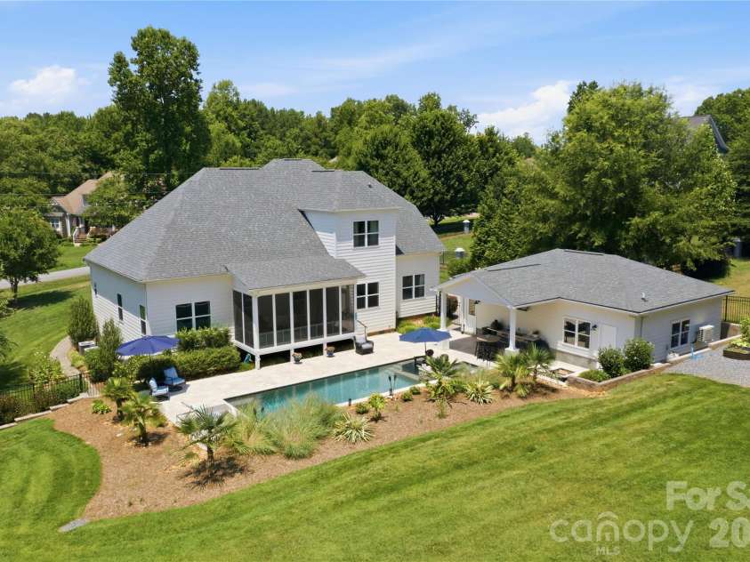 7478 Brotherton Road, Denver, NC 28037.  MLS# CAR4399336, YatesRealty ID 34984. A custom home with pool, spa, firepit and outdoor kitchen