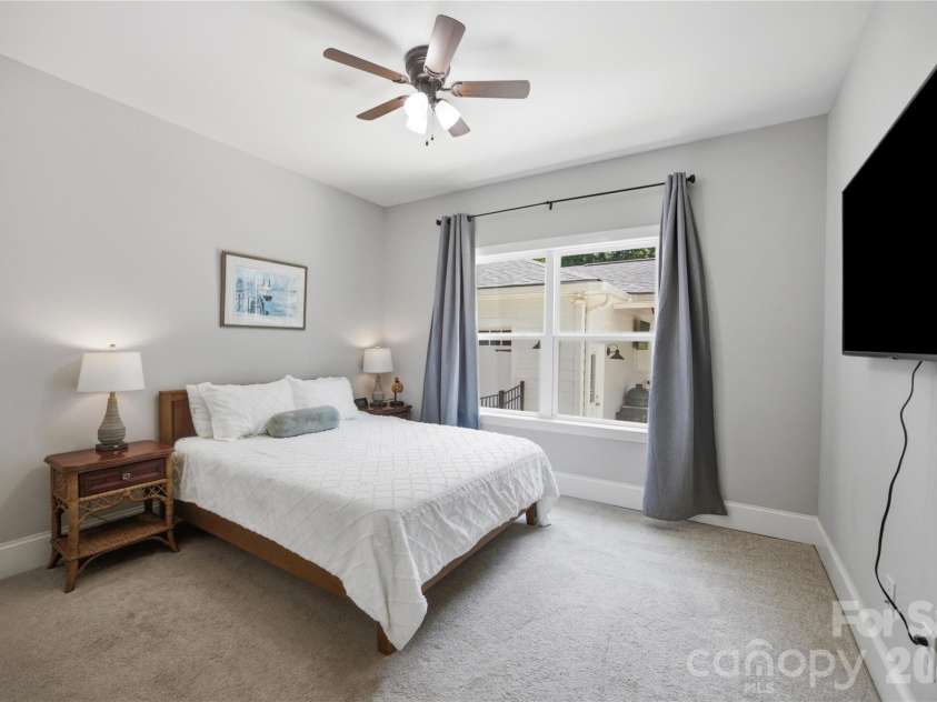 7478 Brotherton Road, Denver, NC 28037.  MLS# CAR4399336, YatesRealty ID 34984. Main-level guest suite overlooks back patio