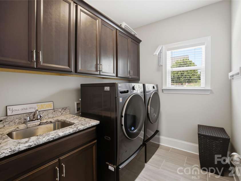 7478 Brotherton Road, Denver, NC 28037.  MLS# CAR4399336, YatesRealty ID 34984. Main level laundry room