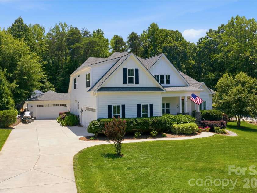 7478 Brotherton Road, Denver, NC 28037.  MLS# CAR4399336, YatesRealty ID 34984. Plenty of parking with garage, workshop, front driveway plus additional side driveway