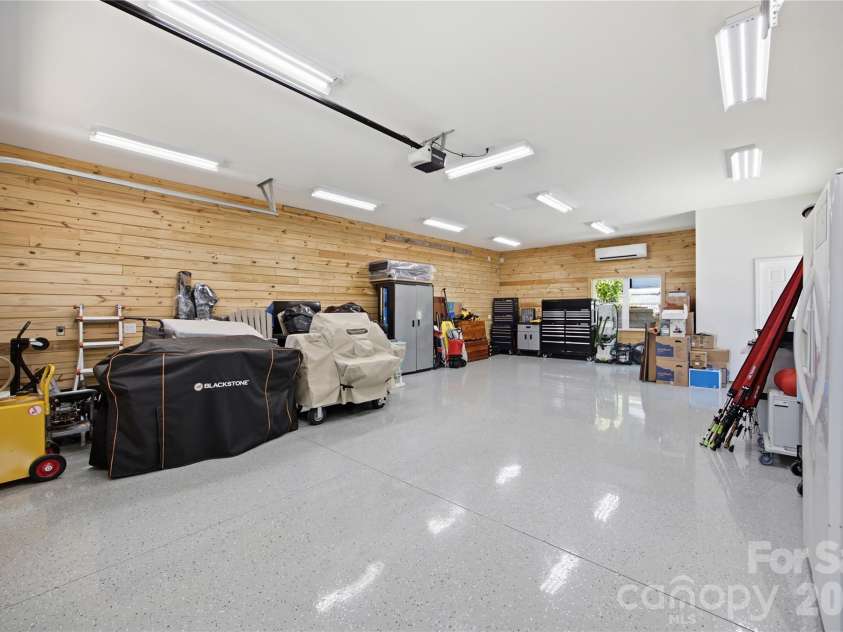 7478 Brotherton Road, Denver, NC 28037.  MLS# CAR4399336, YatesRealty ID 34984. Workshop features epoxy flooring, it's own HVAC and a half bath.