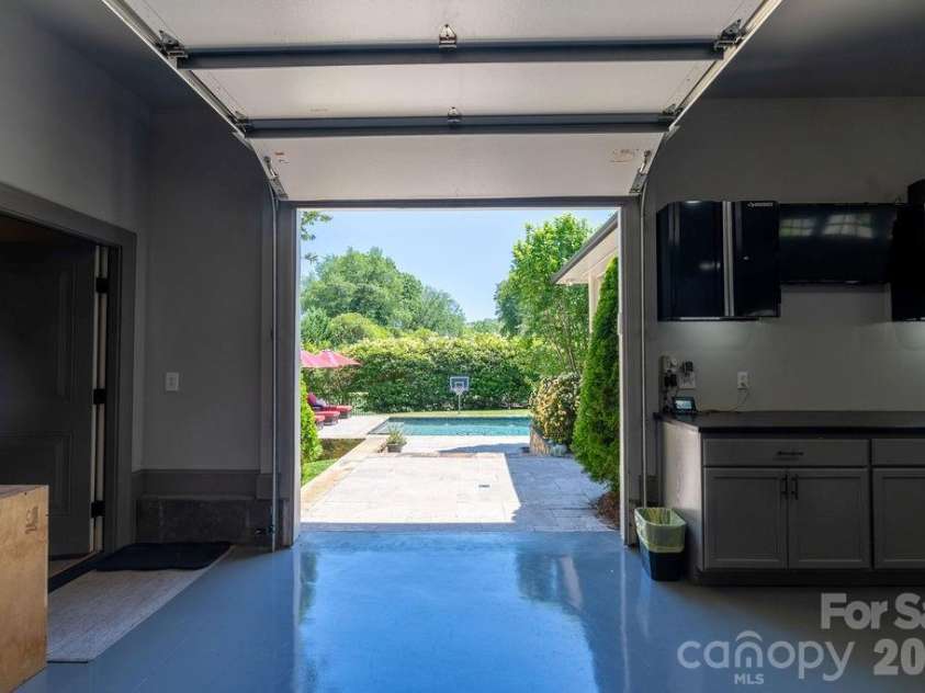 3335 Providence Road, Charlotte, NC 28211.  MLS# CAR4370866, YatesRealty ID 34988. Garage opens to pool deck and covered patio