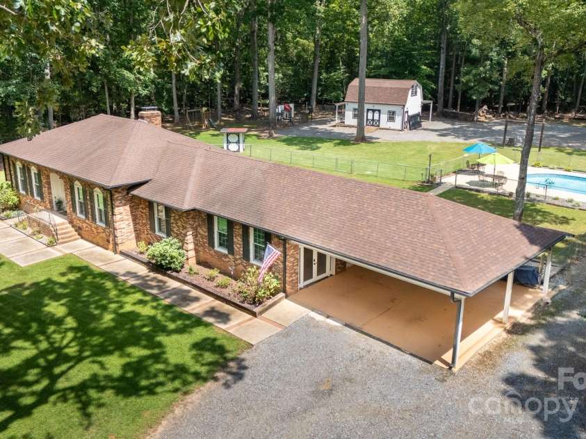 4520 Belhaven Forest Drive, Gastonia, NC 28056.  MLS# CAR4294728, YatesRealty ID 34993. 1.76 acres - well situation for full use