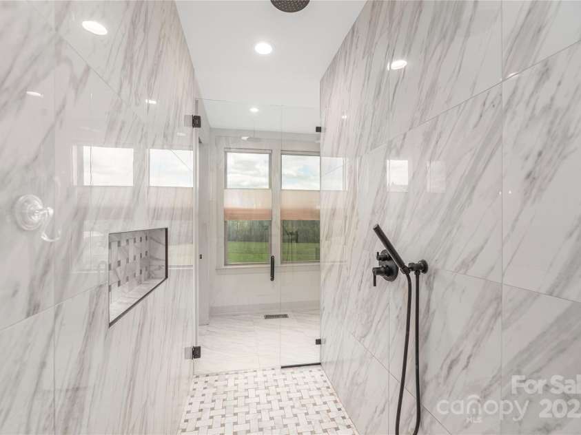 456 Samuel Drive, Mills River, NC 28759.  MLS# CAR4295311, YatesRealty ID 34995. Primary Suite Shower