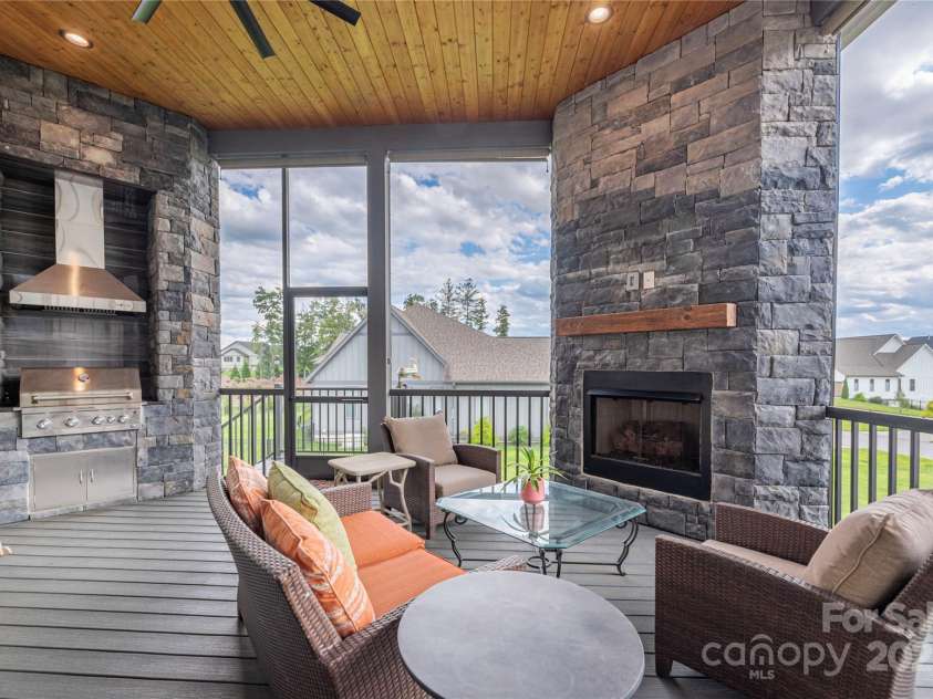 456 Samuel Drive, Mills River, NC 28759.  MLS# CAR4295311, YatesRealty ID 34995. Screen In Porch with Fireplace and Grill