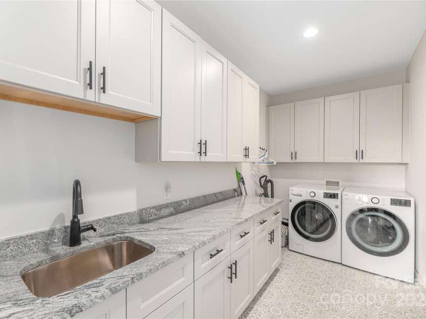 456 Samuel Drive, Mills River, NC 28759.  MLS# CAR4295311, YatesRealty ID 34995. Spacious Laundry Room