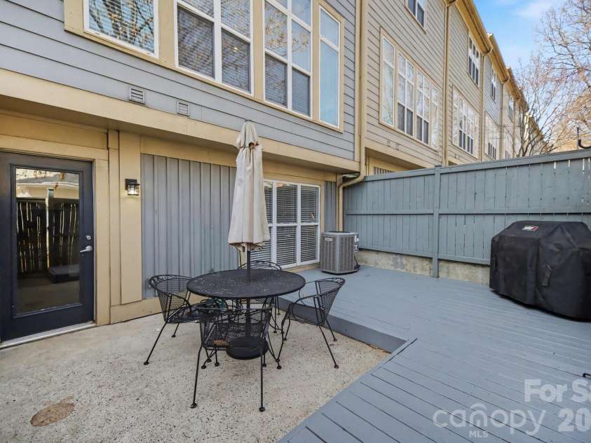 906 Garden District Drive, Charlotte, NC 28202.  MLS# CAR4391842, YatesRealty ID 34995. Enclosed outdoor patio and deck space for relaxing or entertaining!