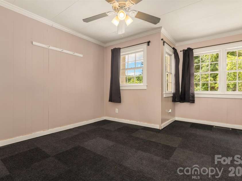 100 Cannon Drive, Hendersonville, NC 28792.  MLS# CAR4397088, YatesRealty ID 34998. Main Level Bedroom 2