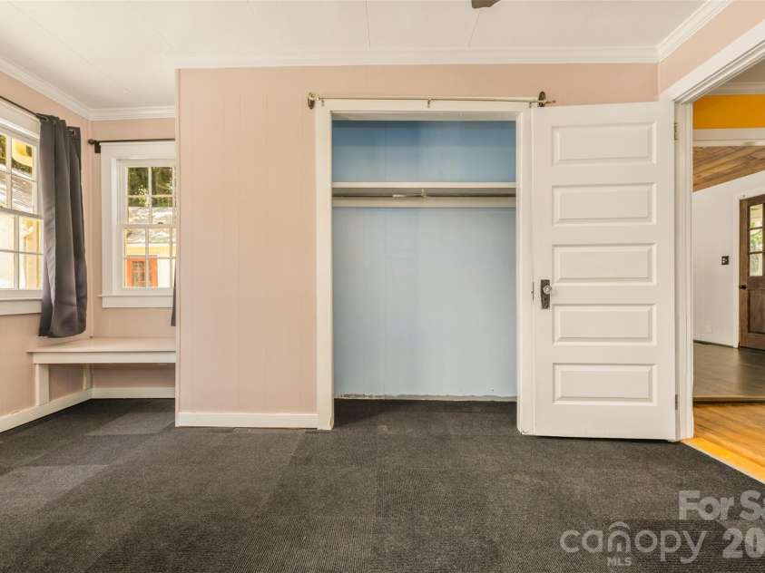 100 Cannon Drive, Hendersonville, NC 28792.  MLS# CAR4397088, YatesRealty ID 34998. Main Level Bedroom 2