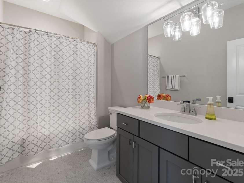 13630 Tranquil Day Drive, Matthews, NC 28105.  MLS# CAR4291117, YatesRealty ID 35000. Upstairs Bathroom