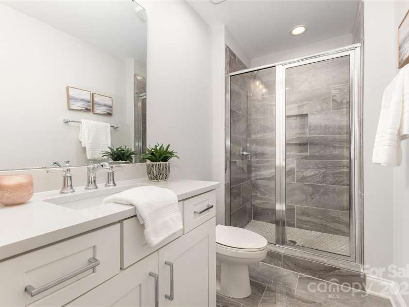12313 Landry Renee Place, Charlotte, NC 28277.  MLS# CAR4294367, YatesRealty ID 35001. 1st Floor Bath tile matching walls