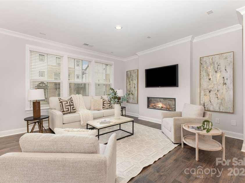 12313 Landry Renee Place, Charlotte, NC 28277.  MLS# CAR4294367, YatesRealty ID 35001. Family Room with Modern Electric fireplace