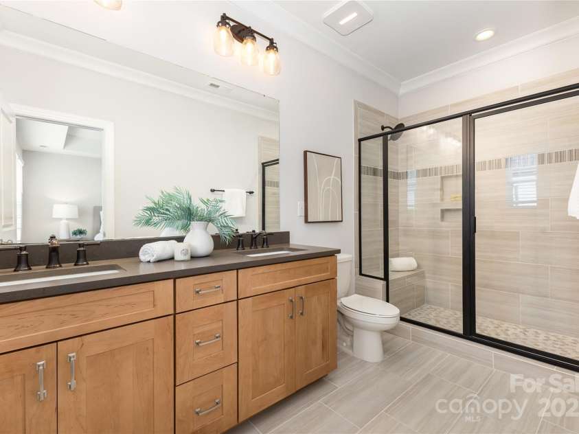 12313 Landry Renee Place, Charlotte, NC 28277.  MLS# CAR4294367, YatesRealty ID 35001. Owners Suite 2 Bath dual vanity matching floor and tile