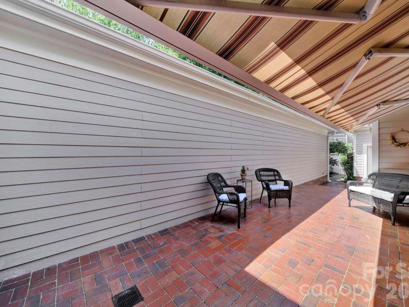 4214 Settler Heights Drive, Fort Mill, SC 29708.  MLS# CAR4375542, YatesRealty ID 35002. Private Patio with Awning