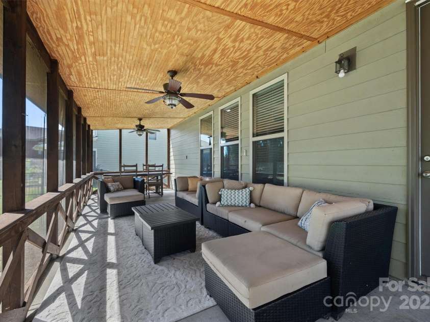 1711 Kelley Lake Drive, York, SC 29745.  MLS# CAR4295365, YatesRealty ID 35003. This oversized screen porch is the perfect place to relax outside!