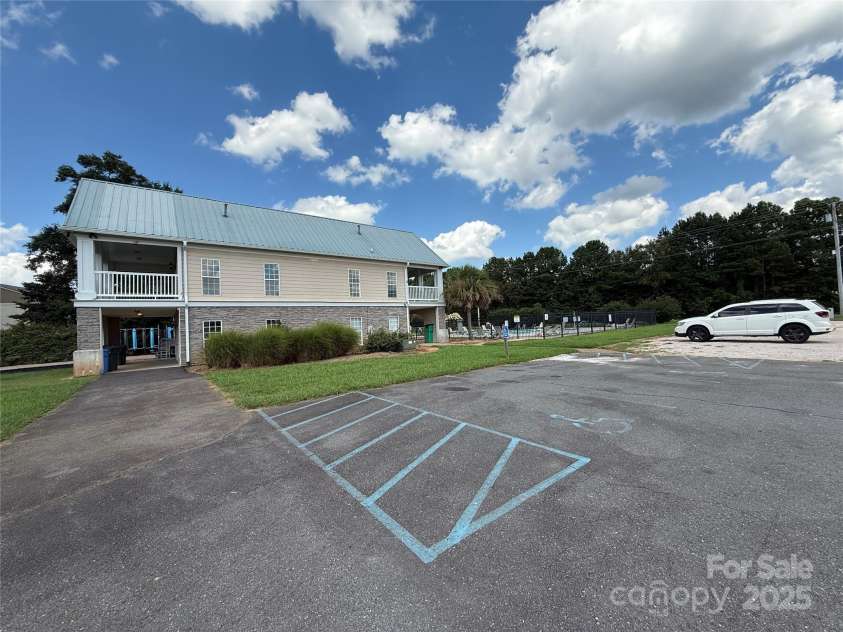 570 Montgomery Drive, Rock Hill, SC 29732.  MLS# CAR4295047, YatesRealty ID 35005. Side view of 2 story clubhouse