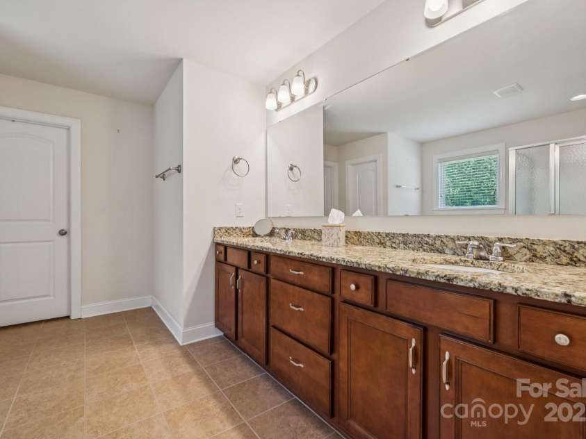 3922 Martele Drive, Mint Hill, NC 28227.  MLS# CAR4292629, YatesRealty ID 35015. Dual Sinks in the Owner's Bathroom
