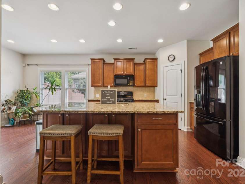3922 Martele Drive, Mint Hill, NC 28227.  MLS# CAR4292629, YatesRealty ID 35015. Large Island with Granite Countertops