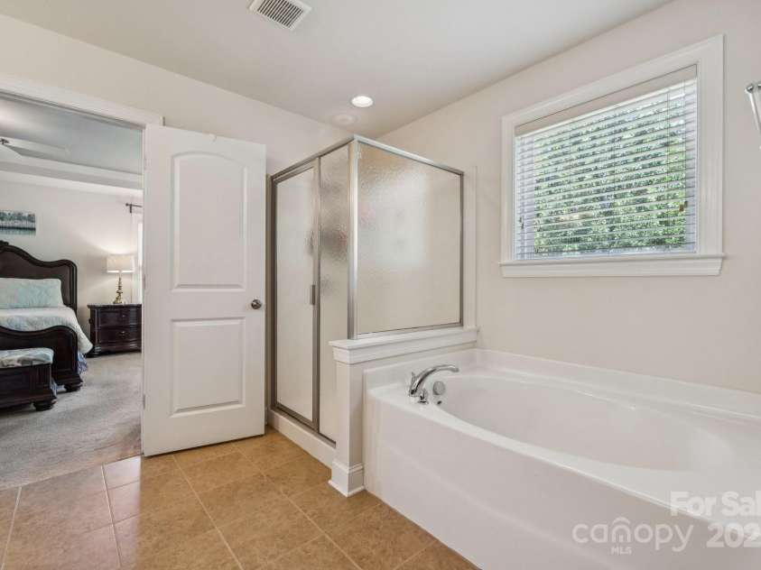 3922 Martele Drive, Mint Hill, NC 28227.  MLS# CAR4292629, YatesRealty ID 35015. Owner's Bathroom- separate Tub & shower
