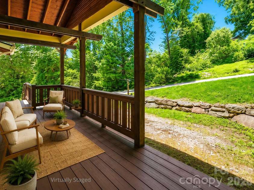 25 Shady Park Lane, Asheville, NC 28804.  MLS# CAR4395453, YatesRealty ID 35017. Virtually staged. Covered front deck.