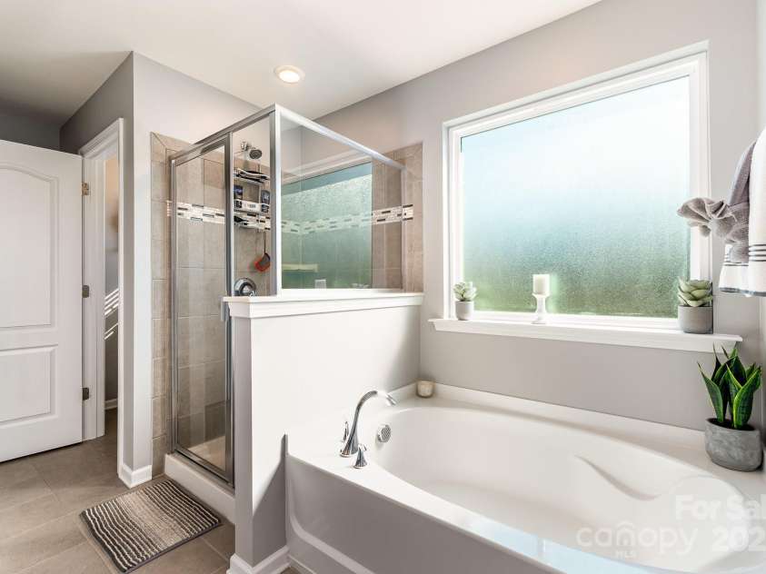 1037 Delridge Street, Waxhaw, NC 28173.  MLS# CAR4234424, YatesRealty ID 3502. Primary Bathroom