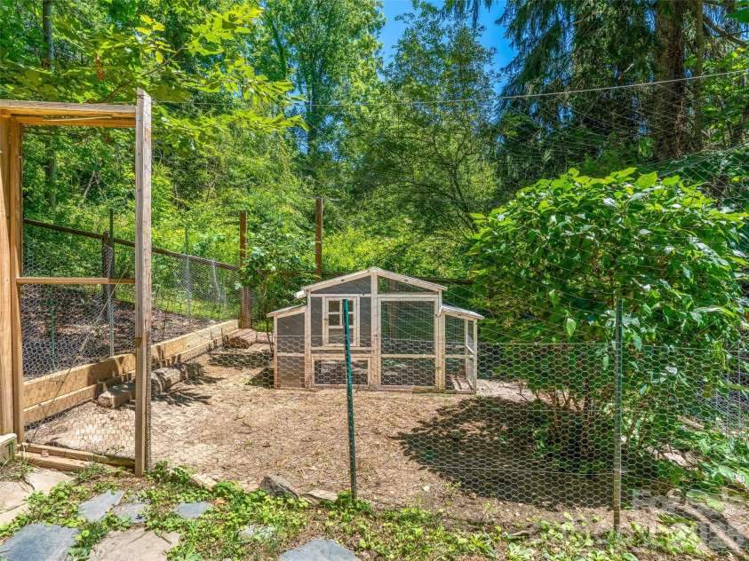 148 Sand Hill Road, Asheville, NC 28806.  MLS# CAR4396689, YatesRealty ID 35020. Chicken coop waiting for your flock!