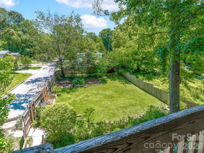148 Sand Hill Road, Asheville, NC 28806.  MLS# CAR4396689, YatesRealty ID 35020. Large, sprawling flat lot with so many features.