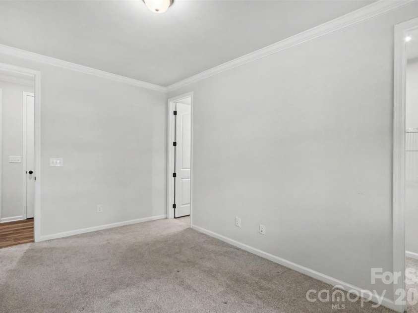 16704 Summers Walk Boulevard, Davidson, NC 28036.  MLS# CAR4397795, YatesRealty ID 35023. Bedroom on 1st floor