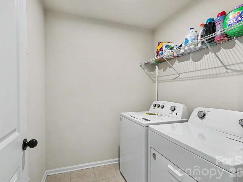 16704 Summers Walk Boulevard, Davidson, NC 28036.  MLS# CAR4397795, YatesRealty ID 35023. Laundry room on 3rd floor