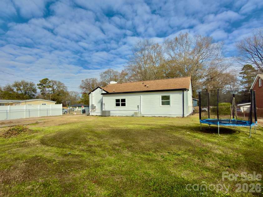 1033 Tracy Drive, Charlotte, NC 28217.  MLS# CAR4373895, YatesRealty ID 35024. Huge fenced backyard