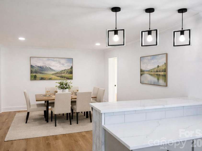 1033 Tracy Drive, Charlotte, NC 28217.  MLS# CAR4373895, YatesRealty ID 35024. Kitchen view into dining area