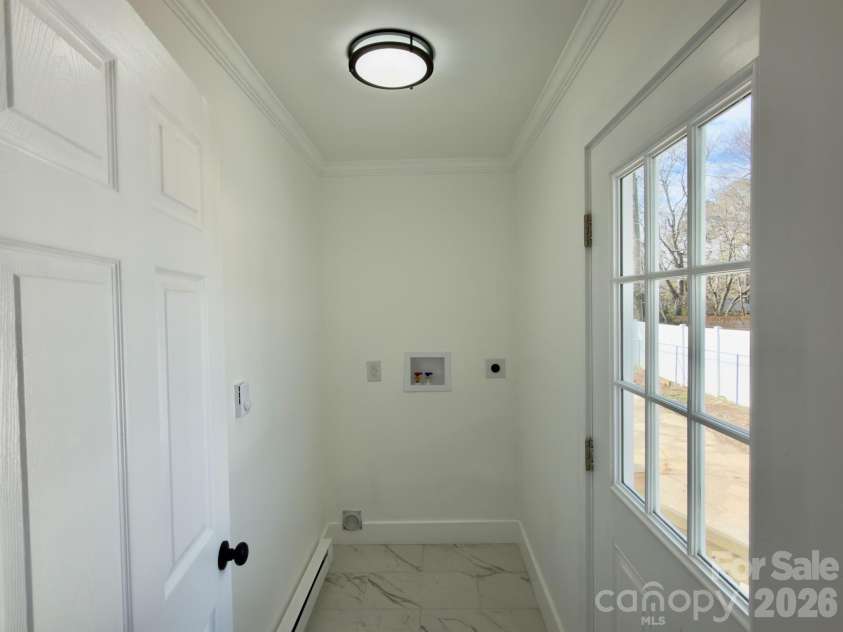 1033 Tracy Drive, Charlotte, NC 28217.  MLS# CAR4373895, YatesRealty ID 35024. Laundry room