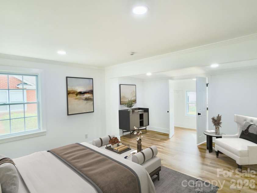 1033 Tracy Drive, Charlotte, NC 28217.  MLS# CAR4373895, YatesRealty ID 35024. Virtually staged 1st master bedrrom