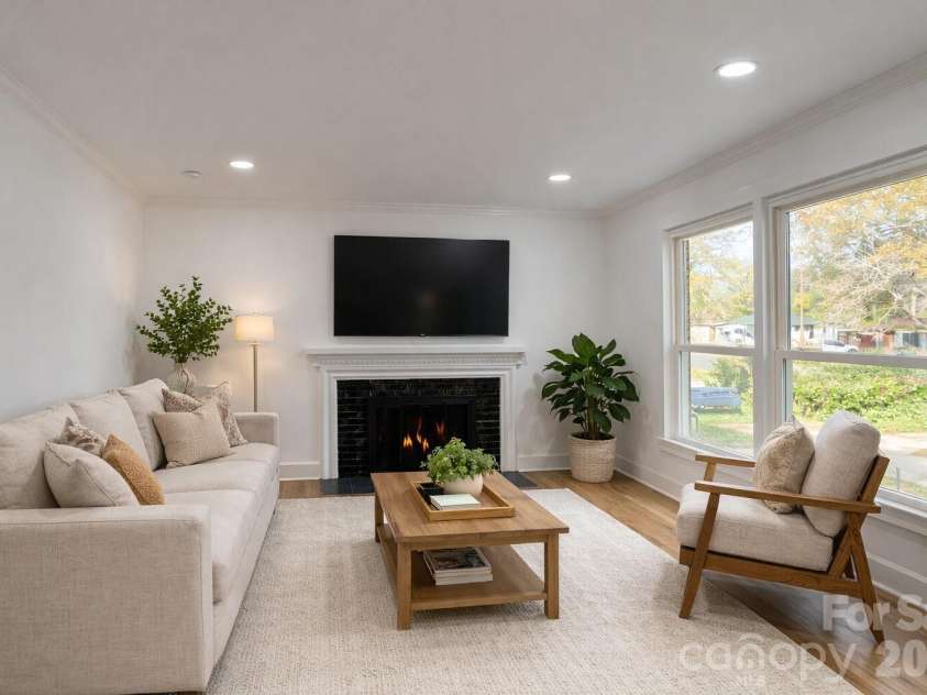 1033 Tracy Drive, Charlotte, NC 28217.  MLS# CAR4373895, YatesRealty ID 35024. Virtually staged living room
