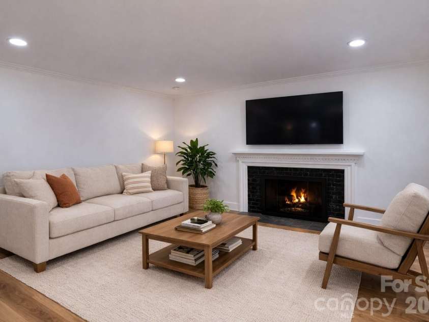 1033 Tracy Drive, Charlotte, NC 28217.  MLS# CAR4373895, YatesRealty ID 35024. Virtually staged living room