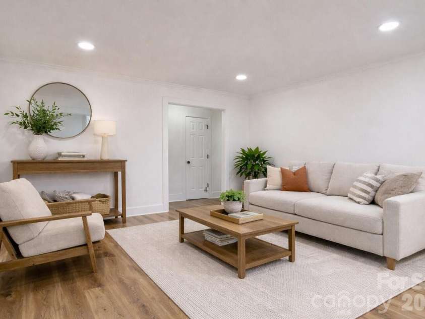 1033 Tracy Drive, Charlotte, NC 28217.  MLS# CAR4373895, YatesRealty ID 35024. Virtually staged living room
