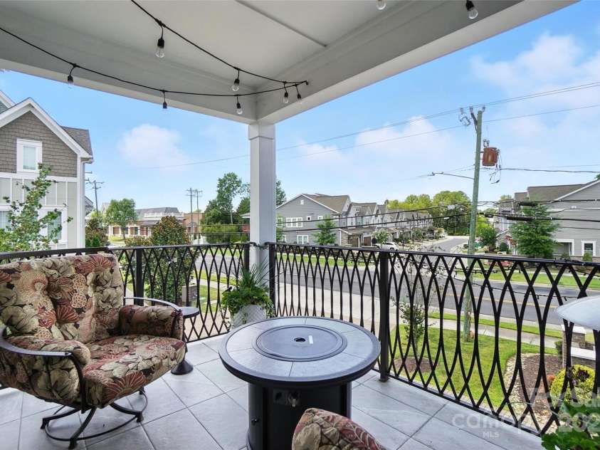7903 Rea View Court, Charlotte, NC 28226.  MLS# CAR4284335, YatesRealty ID 35024. Balcony Over-looking vibrant shops and retail across the street
