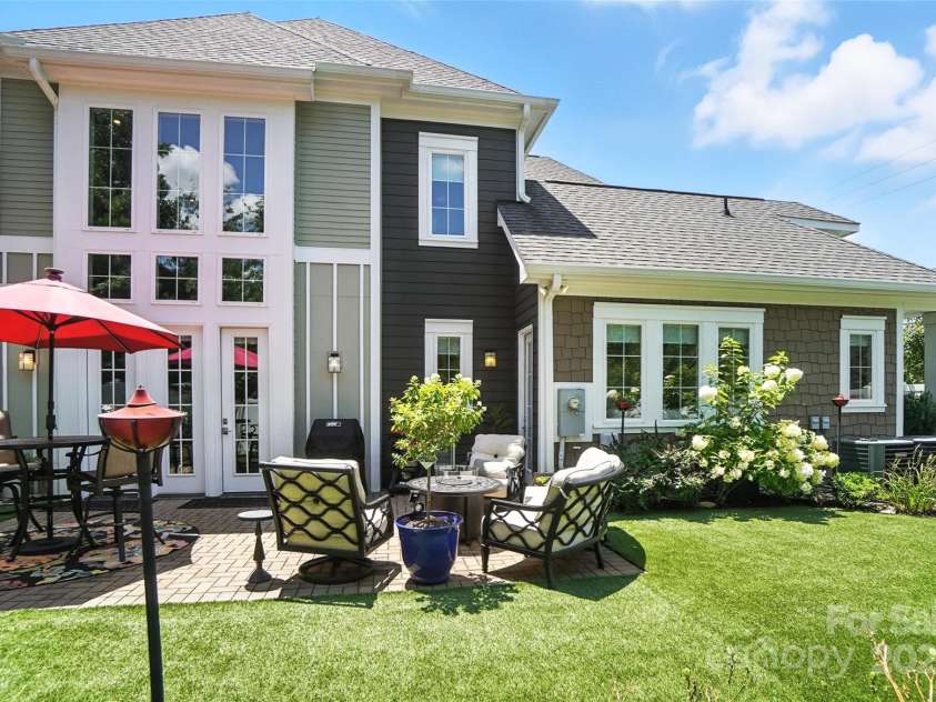 7903 Rea View Court, Charlotte, NC 28226.  MLS# CAR4284335, YatesRealty ID 35024. Unbelievable fully fenced-in backyard oasis with turf and lush landscaping
