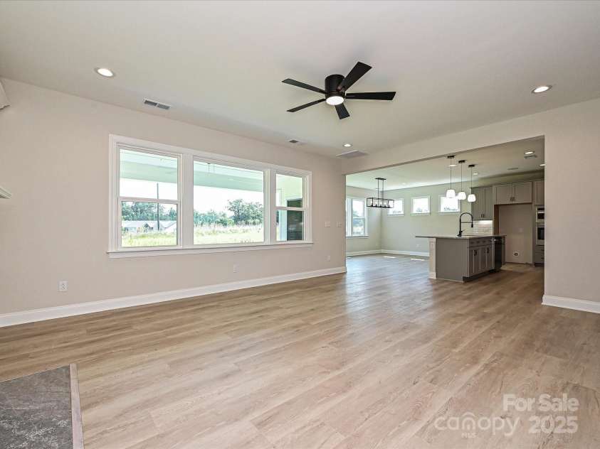 113 Tonbridge Way, Mooresville, NC 28115.  MLS# CAR4264342, YatesRealty ID 35027. Family Room/Kitchen/Breakfast