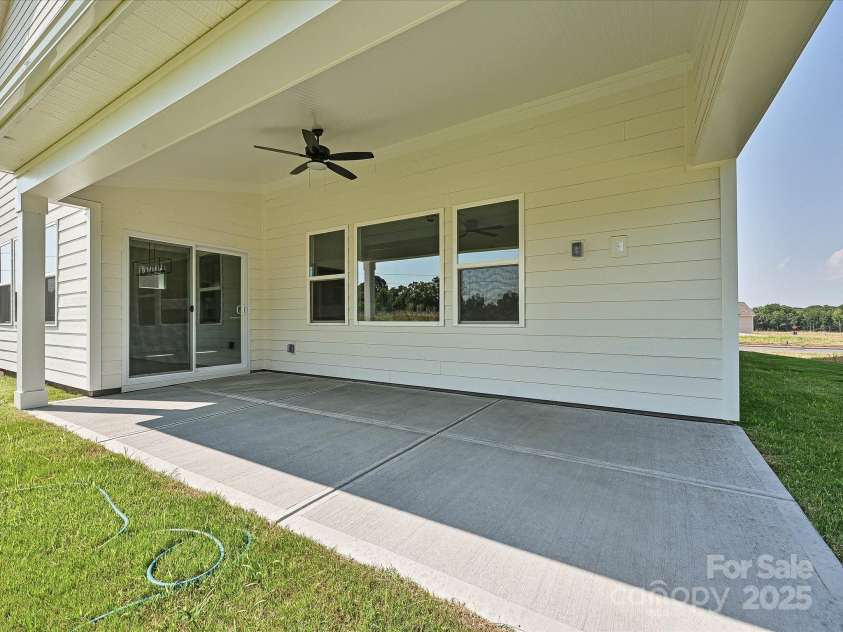 113 Tonbridge Way, Mooresville, NC 28115.  MLS# CAR4264342, YatesRealty ID 35027. Rear Covered Patio