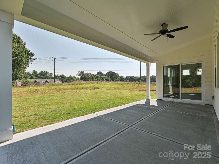 113 Tonbridge Way, Mooresville, NC 28115.  MLS# CAR4264342, YatesRealty ID 35027. Rear Covered Patio
