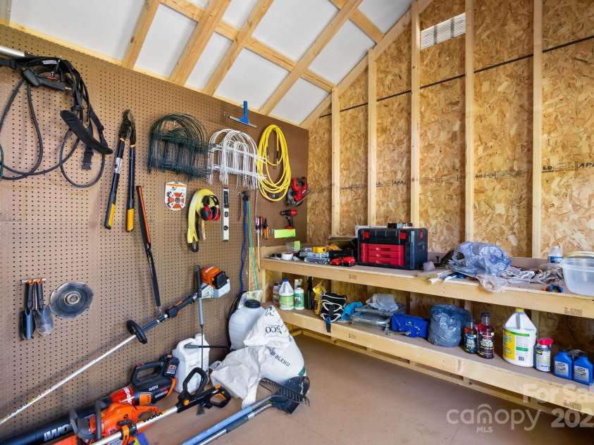 102 Kiwassa Lane, Hendersonville, NC 28792.  MLS# CAR4333333, YatesRealty ID 35028. Inside the shed 