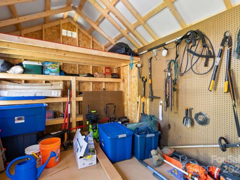 102 Kiwassa Lane, Hendersonville, NC 28792.  MLS# CAR4333333, YatesRealty ID 35028. Inside the Shed- plenty of space 