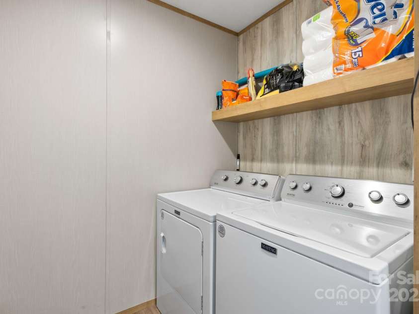 102 Kiwassa Lane, Hendersonville, NC 28792.  MLS# CAR4333333, YatesRealty ID 35028. Laundry off the kitchen 