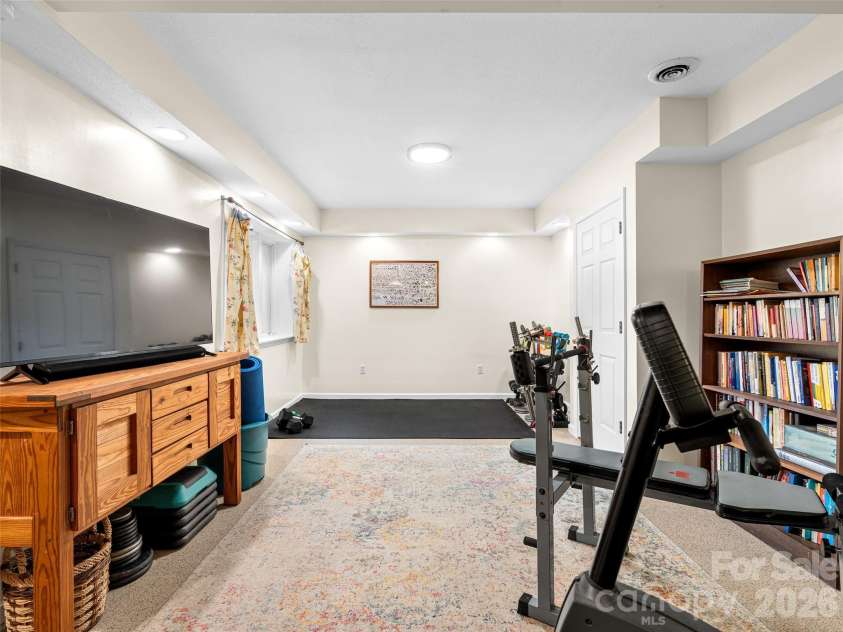 22 Meadow Brook Drive, Fletcher, NC 28732.  MLS# CAR4398596, YatesRealty ID 35029. Recreation room with windows