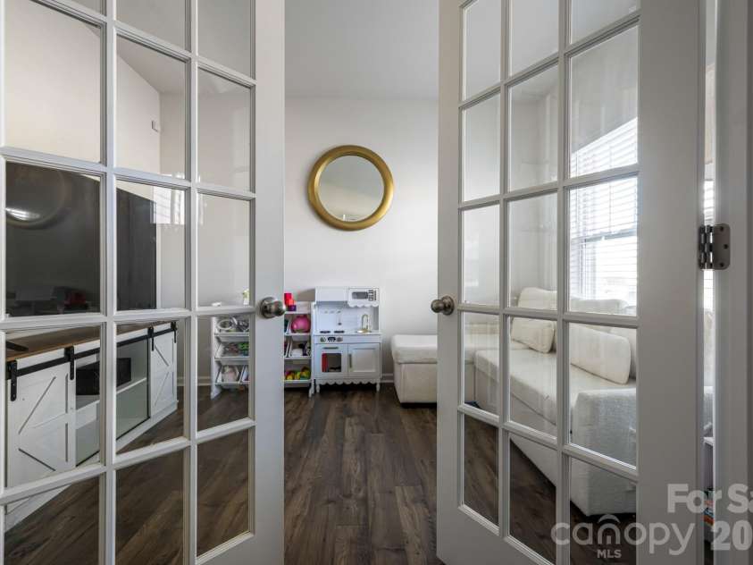 162 Wheatfield Road, Fletcher, NC 28732.  MLS# CAR4396521, YatesRealty ID 35030. Front room with beauitful french doors