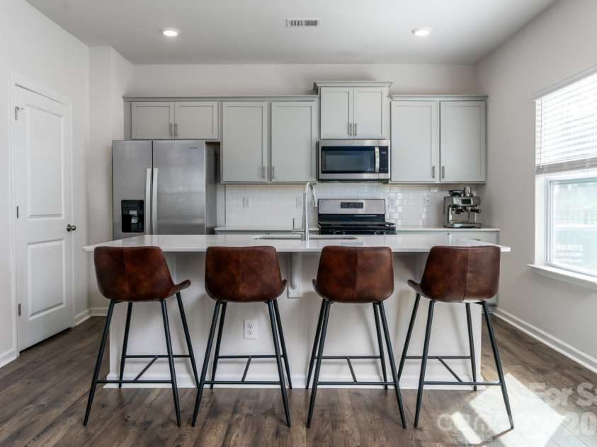162 Wheatfield Road, Fletcher, NC 28732.  MLS# CAR4396521, YatesRealty ID 35030. Kitchen Island with seating