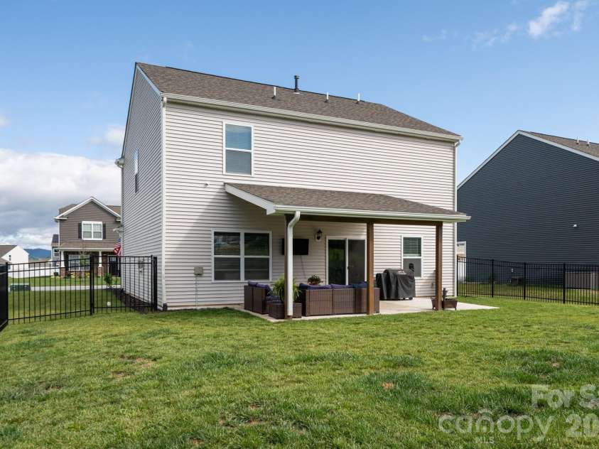 162 Wheatfield Road, Fletcher, NC 28732.  MLS# CAR4396521, YatesRealty ID 35030. Level back yard