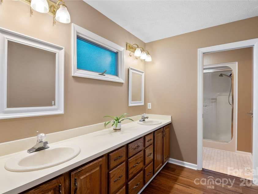 131 Jenny Lind Drive, Hendersonville, NC 28791.  MLS# CAR4294642, YatesRealty ID 35033. Owner's Bath